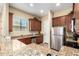 Kitchen with stainless steel appliances and granite counters at 846 N Pueblo Dr # 113, Casa Grande, AZ 85122