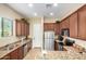 Kitchen with stainless steel appliances and granite counters at 846 N Pueblo Dr # 113, Casa Grande, AZ 85122