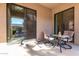 Patio with seating area and sliding glass door at 846 N Pueblo Dr # 113, Casa Grande, AZ 85122