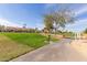 Golf course view with pathway and trees at 9303 W Morrow Dr, Peoria, AZ 85382