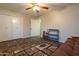 Spacious bedroom with double doors and tiled floors at 10701 W Salem Dr, Sun City, AZ 85351