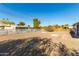 Spacious backyard with gravel and a small patio area at 12216 N 107Th Ave, Sun City, AZ 85351