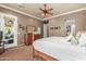 Main bedroom with access to the patio and dresser at 12832 W Pinnacle Vista Dr, Peoria, AZ 85383