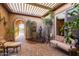 Relaxing courtyard with seating area and fountain at 12832 W Pinnacle Vista Dr, Peoria, AZ 85383