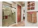 Large walk-in shower with tiled walls and glass door at 12832 W Pinnacle Vista Dr, Peoria, AZ 85383