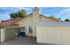 Backyard view of home with shed and AC unit at 13108 N 76Th St, Scottsdale, AZ 85260