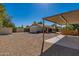 Gravel backyard with covered parking area at 13108 N 76Th St, Scottsdale, AZ 85260