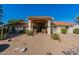 House exterior showcasing a Spanish style home with a covered entryway at 13108 N 76Th St, Scottsdale, AZ 85260