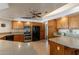 Bright kitchen boasts stainless steel appliances and abundant cabinetry at 13108 N 76Th St, Scottsdale, AZ 85260
