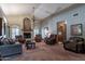 Comfortable living room with a fireplace and ample seating at 13108 N 76Th St, Scottsdale, AZ 85260