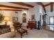 Living area featuring a cozy sitting area and a decorative statue at 13108 N 76Th St, Scottsdale, AZ 85260
