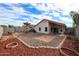 Spacious backyard with gravel and red mulch landscaping at 13652 W Fargo Dr, Surprise, AZ 85374