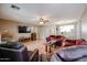 Open living room with a view of the dining area and kitchen at 13652 W Fargo Dr, Surprise, AZ 85374