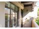 Private condo entrance with security door and window at 1449 E Highland Ave # 36, Phoenix, AZ 85014