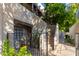 Condo exterior with gated entrance and walkway at 1449 E Highland Ave # 36, Phoenix, AZ 85014