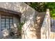 Exterior stairs leading to condo entrance, surrounded by landscaping at 1449 E Highland Ave # 36, Phoenix, AZ 85014