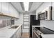 Modern kitchen with stainless steel appliances at 1449 E Highland Ave # 36, Phoenix, AZ 85014