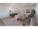 Dining room with wood table and modern chandelier at 18522 W Mountain View Rd, Waddell, AZ 85355