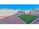 Small backyard with artificial turf and gravel at 20058 N 109Th Dr, Sun City, AZ 85373