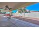 Covered patio, gravel yard, and view of neighboring homes at 20058 N 109Th Dr, Sun City, AZ 85373
