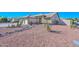 Landscaped front yard with unique rock features and cacti at 20058 N 109Th Dr, Sun City, AZ 85373