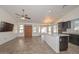 Open concept kitchen with island and stainless steel appliances at 20058 N 109Th Dr, Sun City, AZ 85373