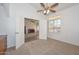 Bright office space with carpet flooring and ceiling fan at 20058 N 109Th Dr, Sun City, AZ 85373