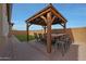 Covered patio with table and chairs, perfect for outdoor dining at 22446 E Russet Rd, Queen Creek, AZ 85142