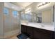 Large bathroom with a walk in shower and double vanity at 22446 E Russet Rd, Queen Creek, AZ 85142