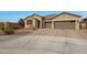 One-story home with a two-car garage and landscaped front yard at 22446 E Russet Rd, Queen Creek, AZ 85142