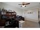 Home office with desk, computer, and comfortable seating at 22446 E Russet Rd, Queen Creek, AZ 85142