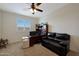 Home office with desk, computer, and seating at 22446 E Russet Rd, Queen Creek, AZ 85142