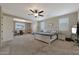 Main bedroom with sitting area and access to private office at 22446 E Russet Rd, Queen Creek, AZ 85142
