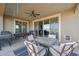 Covered patio with outdoor furniture and a built-in grill at 22446 E Russet Rd, Queen Creek, AZ 85142