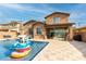 Inviting backyard oasis with a sparkling pool and patio at 4102 S 186Th Ave, Goodyear, AZ 85338