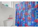 Bathroom with Spiderman shower curtain and toilet at 4102 S 186Th Ave, Goodyear, AZ 85338