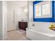 Main bathroom with soaking tub and double vanity at 4102 S 186Th Ave, Goodyear, AZ 85338