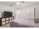 Bedroom with double bed, TV, and ample closet space at 4102 S 186Th Ave, Goodyear, AZ 85338