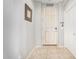 Bright entryway with tiled floor and a white door at 4102 S 186Th Ave, Goodyear, AZ 85338
