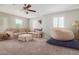 Spacious living area with sectional sofa and beanbag chair at 4102 S 186Th Ave, Goodyear, AZ 85338