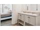 Bathroom with double vanity and a view of the bedroom at 48194 W Dune Shadow Rd, Maricopa, AZ 85139