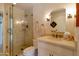 Clean bathroom with walk-in shower, toilet, and a single vanity at 6701 N Scottsdale Rd # 20, Scottsdale, AZ 85250