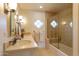 Elegant bathroom with double vanity, large shower, and mosaic tile at 6701 N Scottsdale Rd # 20, Scottsdale, AZ 85250