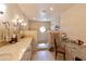 Elegant bathroom with double vanity, walk-in shower, and separate vanity area at 6701 N Scottsdale Rd # 20, Scottsdale, AZ 85250