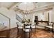 Elegant dining room with hardwood floors and a chandelier at 6701 N Scottsdale Rd # 20, Scottsdale, AZ 85250