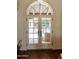 Ornate French doors opening to a private patio at 6701 N Scottsdale Rd # 20, Scottsdale, AZ 85250
