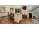 Kitchen features an island with seating and built-in wine storage at 6701 N Scottsdale Rd # 20, Scottsdale, AZ 85250