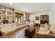 Charming library featuring built-in bookshelves and a window seat at 6701 N Scottsdale Rd # 20, Scottsdale, AZ 85250