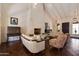 Elegant living room featuring a stunning fireplace and hardwood floors at 6701 N Scottsdale Rd # 20, Scottsdale, AZ 85250