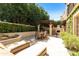 Spacious patio with pergola, dining area, and lounge chairs at 6701 N Scottsdale Rd # 20, Scottsdale, AZ 85250